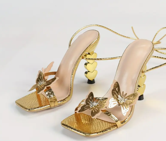 goldene High Heels mit Schmetterlinge